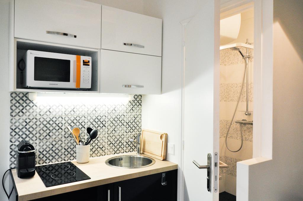 Appartamento Duplex De Charme Au Coeur De Montmartre Parigi Camera foto