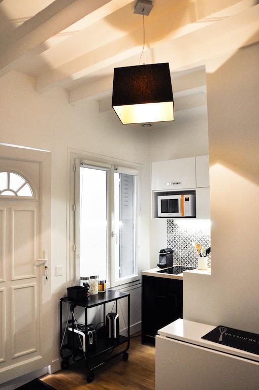 Appartamento Duplex De Charme Au Coeur De Montmartre Parigi Camera foto