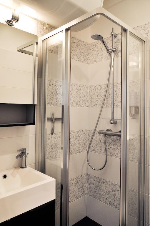 Appartamento Duplex De Charme Au Coeur De Montmartre Parigi Camera foto