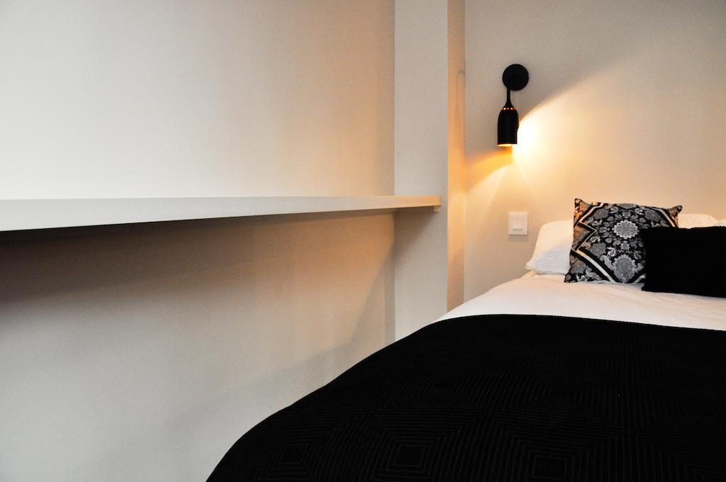 Appartamento Duplex De Charme Au Coeur De Montmartre Parigi Camera foto