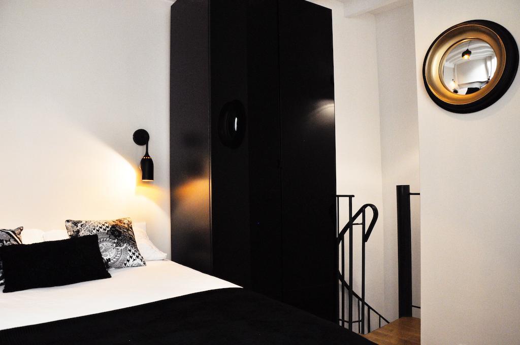 Appartamento Duplex De Charme Au Coeur De Montmartre Parigi Camera foto