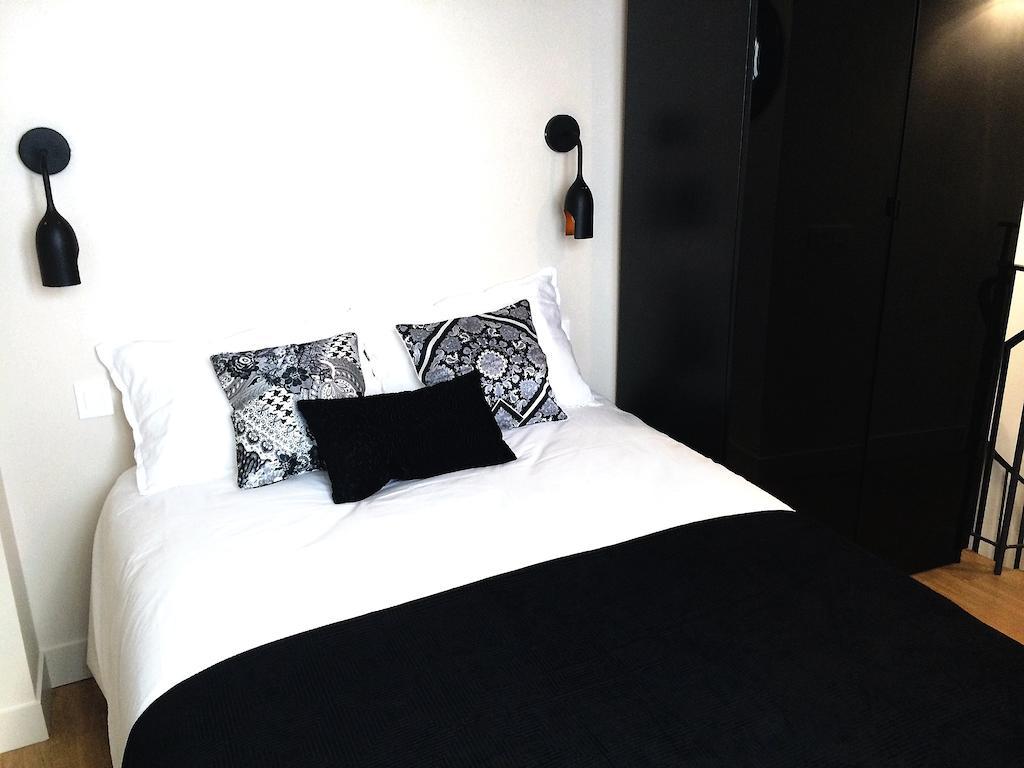 Appartamento Duplex De Charme Au Coeur De Montmartre Parigi Camera foto
