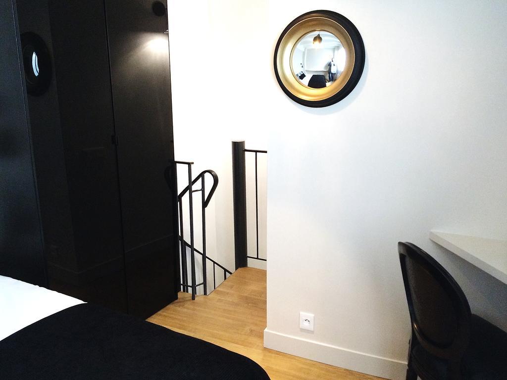 Appartamento Duplex De Charme Au Coeur De Montmartre Parigi Camera foto