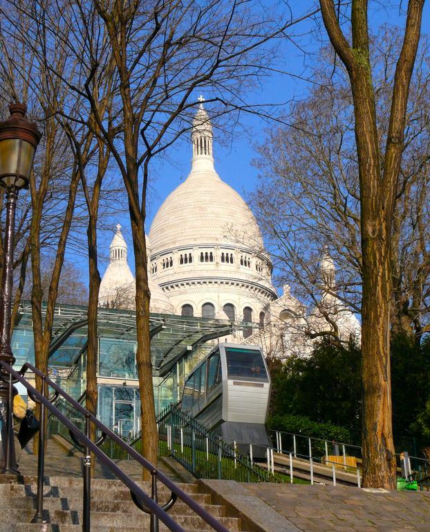 Appartamento Duplex De Charme Au Coeur De Montmartre Parigi Esterno foto